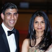 Rishi Sunak alongside his wife Akshata Murthy, who have entered The Sunday Times Rich List for the first time with their joint £730 million fortune, as the Chancellor holds out on fresh support to alleviate the cost-of-living crisis for millions of Britons. (PA)
