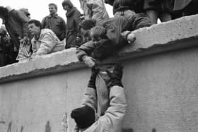 After the fall of the Berlin Wall and the reunification of Germany, the government invested heavily in transforming the former Communist state's economy (Picture: Steve Eason/Hulton Archive/Getty Images)