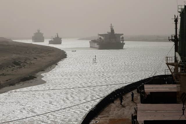 A cargo ship has turned sideways in Egypt's Suez Canal, blocking traffic in a crucial East-West waterway for global shipping. (Photo by Christos GOULIAMAKIS / AFP)