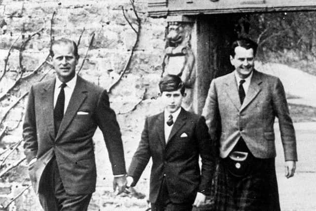 The Prince of Wales, with his father the Duke of Edinburgh (left) and Captain Iain Tennant, Chairman of the Gordonstoun Board of Governors, arriving at Gordonstoun for the Prince's first day at Public School.