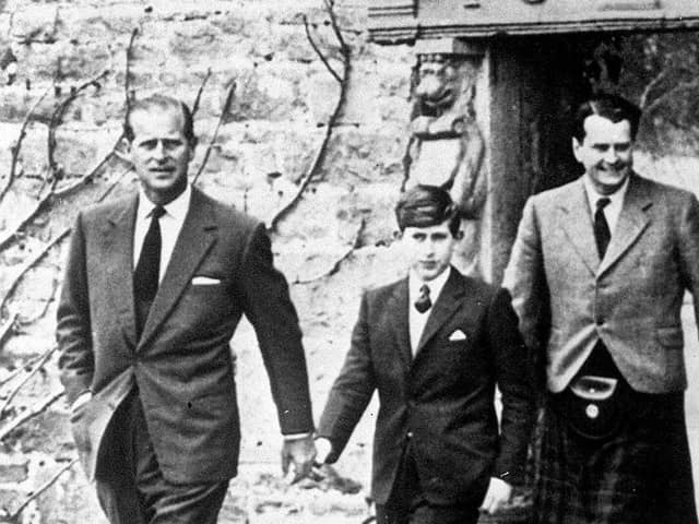 Prince Charles, with his father the Duke of Edinburgh (left) and Captain Iain Tennant, Chairman of the Gordonstoun Board of Governors, arriving at Gordonstoun for the Prince's first day at the school