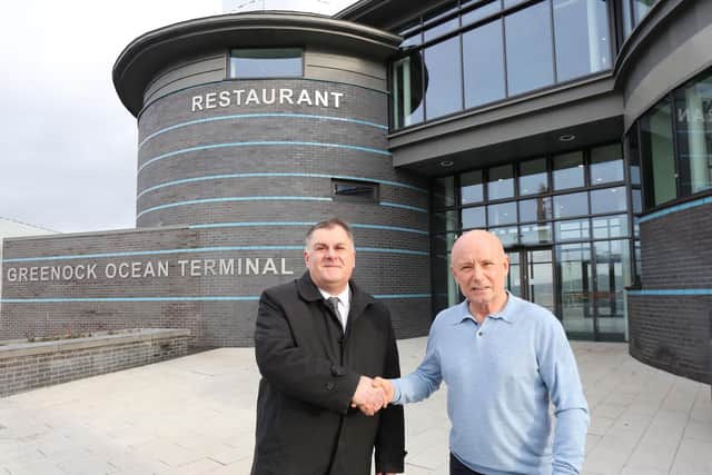 From left: Councillor Stephen McCabe and Buzzworks chairman Colin Blair celebrate the key handover at the new visitor centre. Picture: George Munro.
