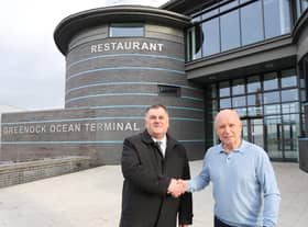 From left: Councillor Stephen McCabe and Buzzworks chairman Colin Blair celebrate the key handover at the new visitor centre. Picture: George Munro.