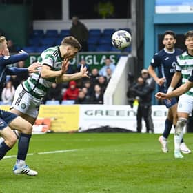 James Forrest sends a diving header into the net for his 102nd Celtic goal. (Photo by Rob Casey / SNS Group)