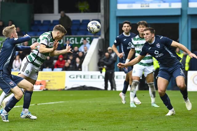 James Forrest sends a diving header into the net for his 102nd Celtic goal. (Photo by Rob Casey / SNS Group)