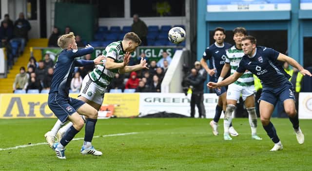 James Forrest sends a diving header into the net for his 102nd Celtic goal. (Photo by Rob Casey / SNS Group)
