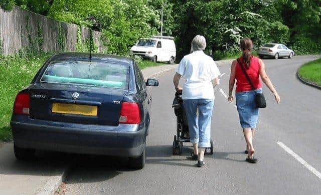 Pavement parking comprises pedestrian safety by forcing them onto roads