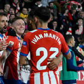 Girona players celebrate a goal against Athletic Club Bilbao at the Montilivi Stadium in Girona on November 27, 2023. (Photo by JOSEP LAGO/AFP via Getty Images)