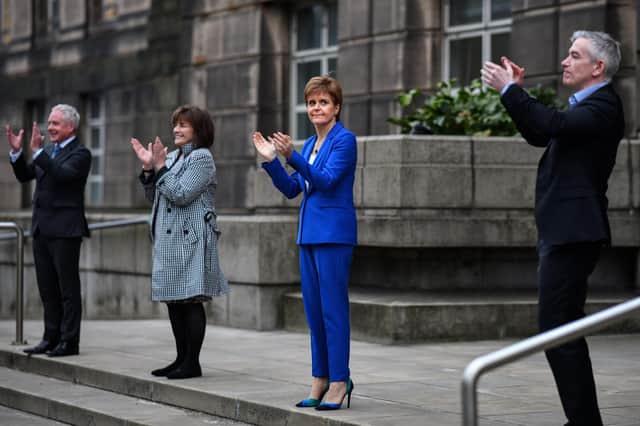 Nicola Sturgeon shows her appreciation during the weekly tribute to NHS and other key workers throughout the coronavirus outbreak (Picture: Jeff J Mitchell/Getty Images)