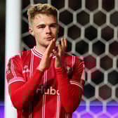 Bristol City's Tommy Conway applauds fans as he leaves the pitch after the 1-0 win over West Ham in the FA Cup third round replay at the Ashton Gate Stadium. (Photo by ADRIAN DENNIS/AFP via Getty Images)