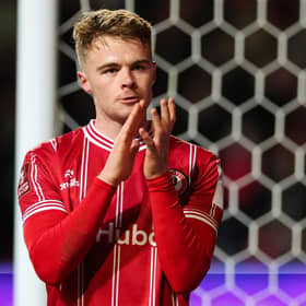 Bristol City's Tommy Conway applauds fans as he leaves the pitch after the 1-0 win over West Ham in the FA Cup third round replay at the Ashton Gate Stadium. (Photo by ADRIAN DENNIS/AFP via Getty Images)