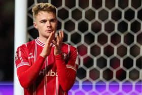 Bristol City's Tommy Conway applauds fans as he leaves the pitch after the 1-0 win over West Ham in the FA Cup third round replay at the Ashton Gate Stadium. (Photo by ADRIAN DENNIS/AFP via Getty Images)