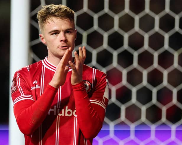 Bristol City's Tommy Conway applauds fans as he leaves the pitch after the 1-0 win over West Ham in the FA Cup third round replay at the Ashton Gate Stadium. (Photo by ADRIAN DENNIS/AFP via Getty Images)