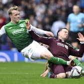 Hibs Jake Doyle-Hayes challenges Hearts' Barrie McKay during the match at Hampden.