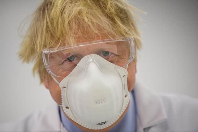 Prime Minister Boris Johnson visits the French biotechnology laboratory Valneva, in Livingston, on January 28, 2021. Picture: WATTIE CHEUNG/POOL/AFP via Getty Images
