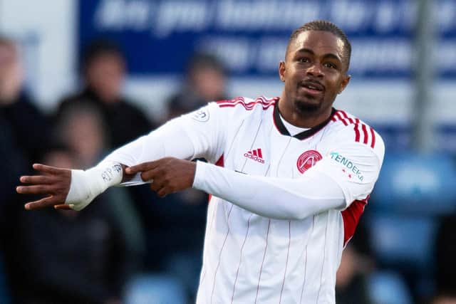 Aberdeen forward Duk celebrates his goal against Ross County.