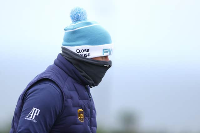Lee Westwood was well wrapped up top combat the cold in the first round of the Scottish Championship presented by AXA at Fairmont St Andrews. Picture: Richard Heathcote/Getty Images