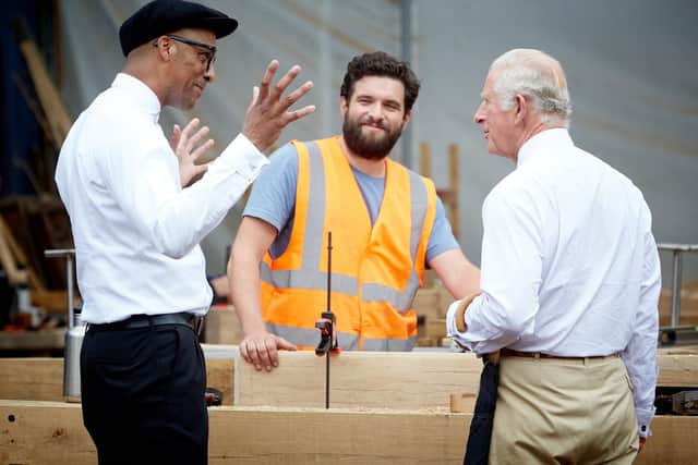 The King, then Prince of Wales and Jay Blades (left) who will appear in a special episode of The Repair Shop as part of the BBC's centenary celebrations. Issue date: Tuesday October 11, 2022.