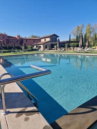 The gorgeous swimming pool area of Villa La Massa. Pic: Getty Images