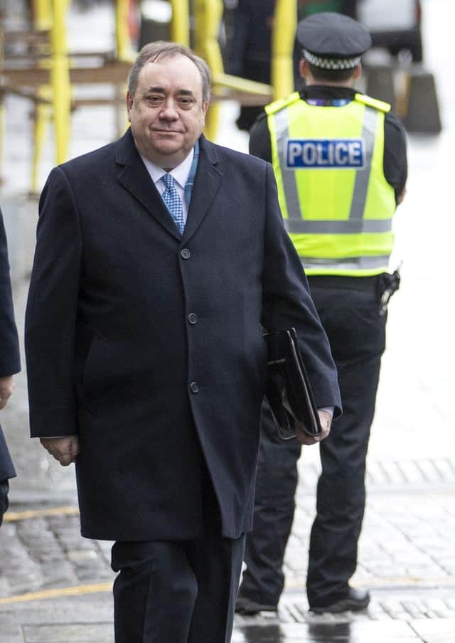 Former Scottish first minister Alex Salmond arrives at the High Court in Edinburgh for the second day of his trial over accusations of sexual assault.
