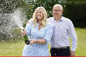 Joe Thwaite, 49, and Jess Thwaite, 46, from Gloucestershire celebrate after winning the record-breaking EuroMillions jackpot of £184m