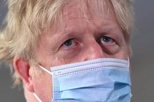 Prime Minister Boris Johnson wears a face mask as he visits Colchester Hospital. Picture: Glyn Kirk - Pool/Getty Images