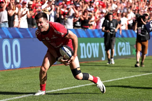 Blair Kinghorn of Toulouse celebrates after scoring their fifth try against Exeter Chiefs.