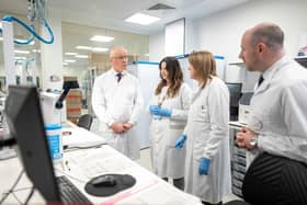 How can First Minister John Swinney, far left, and Health Secretary Neil Gray, seen with blood transfusion workers in Edinburgh in January, treat the Scottish NHS? (Picture: Peter Summers/Getty Images)