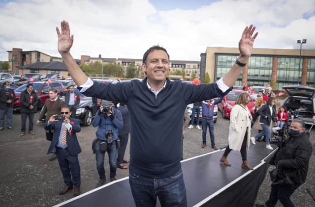 Scottish Labour leader Anas Sarwar on stage at a drive-in rally in Glasgow during campaigning for the Scottish Parliamentary election.