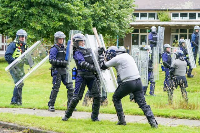 Body-worn cameras would remind officers of the need for high standards and help protect them against false claims (Picture: Jane Barlow/pool/AFP via Getty Images)