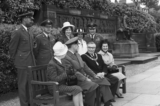 Members of the US Air Force, stationed at Kirknewton, are pictured presenting a Princes Street Gardens park bench to Edinburgh Corporation, represented by Lord Provost Brechin, in 1966.