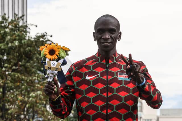 Gold medallist Eliud Kipchoge celebrates after the men's marathon final