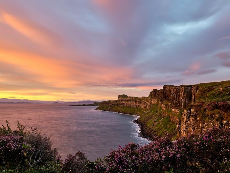 These ancient cliffs are composed of sea-weathered basalt columns that, with their multitude of colours, appear to resemble a kilt and its tartan for some. The cliffs' waterfall, Mealt Falls, sees a 55-metre drop into the sea.