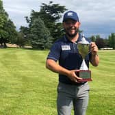 Conor O'Neil shows off the trophy after his victory in the Jessie May World Snooker Golf Championship at Donnington Grove. Picture: PGA EuroPro Tour