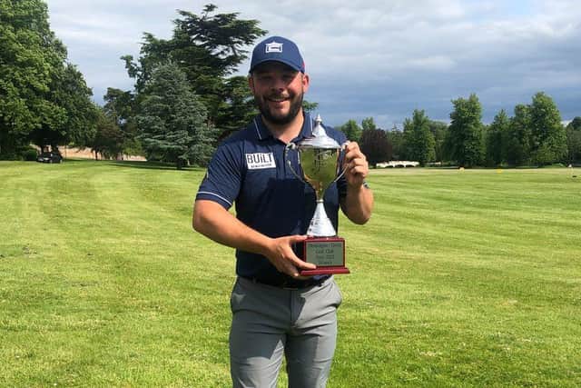 Conor O'Neil shows off the trophy after his victory in the Jessie May World Snooker Golf Championship at Donnington Grove. Picture: PGA EuroPro Tour