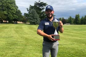 Conor O'Neil shows off the trophy after his victory in the Jessie May World Snooker Golf Championship at Donnington Grove. Picture: PGA EuroPro Tour