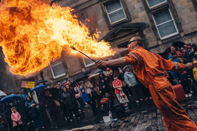 Huge crowds normally gather on the Royal Mile to watch street theatre in August. Picture: David Monteith-Hodge / Photograp
