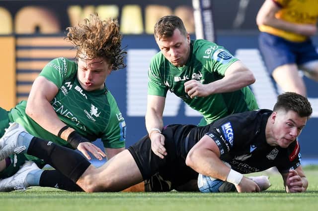 Huw Jones scores an early try for Glasgow Warriors against Connacht. He later went off with a head injury. (Photo by Ross MacDonald / SNS Group)