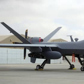 A U.S. MQ-9 drone is on display during an air show at Kandahar Airfield, Afghanistan, Tuesday, Jan. 23, 2018 .A Russian fighter jet downed a US drone operating over the Black Sea on Tuesday, with each nation blaming the other, and tensions heightened around the incident.  (AP Photo/Massoud Hossaini, File)