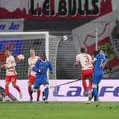 LEIPZIG, GERMANY - APRIL 28: Angelino of RB Leipzig scores their team's first goal during the UEFA Europa League Semi Final Leg One match between RB Leipzig and Rangers at Football Arena Leipzig on April 28, 2022 in Leipzig, Germany. (Photo by Martin Rose/Getty Images)