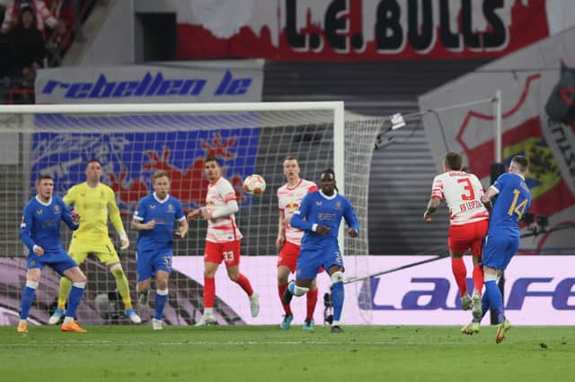 LEIPZIG, GERMANY - APRIL 28: Angelino of RB Leipzig scores their team's first goal during the UEFA Europa League Semi Final Leg One match between RB Leipzig and Rangers at Football Arena Leipzig on April 28, 2022 in Leipzig, Germany. (Photo by Martin Rose/Getty Images)