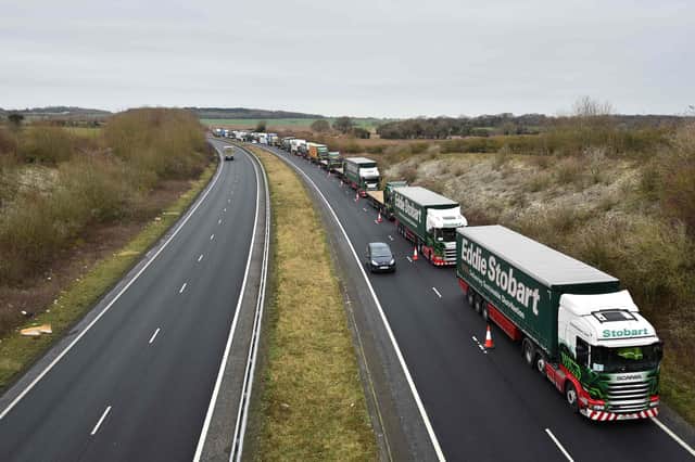 Lorries practice queuing on the A256 a few miles north of Dover in preparation for the end of the Brexit transition period (Picture: Glyn Kirk/AFP via Getty Images)