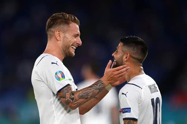 Lorenzo Insigne of Italy (R) celebrates with Ciro Immobile after scoring their side's third goal during the UEFA Euro 2020 Championship Group A match between Turkey and Italy at the Stadio Olimpico on June 11, 2021 in Rome, Italy. (Photo by Mike Hewitt/Getty Images)
