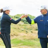 Michele Thomson earns a fist bump from her manager Paul Lawrie after carding a seven-under-par 65 in the first round of the Trust Golf Women's Scottish Open at Dumbarnie Links. Picture: Tristan Jones/LET