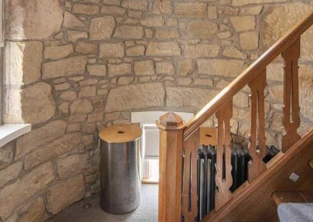 Tower feature in master bedroom with stairs to dressing room and en-suite.