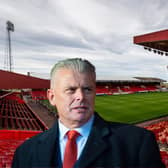 Aberdeen chairman Dave Cormack has urged the authorities to fashion a plan for bringing fans back to games as he made a stark financial warning