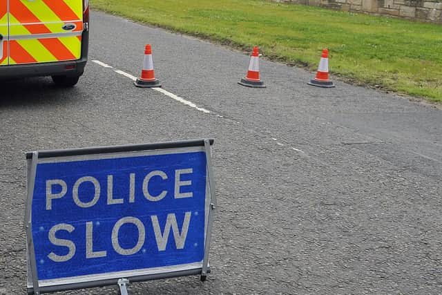 Police have closed off Pluscarden Road near Elgin following a two-car crash. Picture: Michael Gillen.