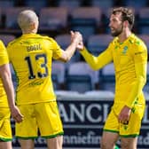 Christian Doidge, far right, scored twice for Hibs at Queen of the South.