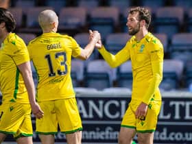 Christian Doidge, far right, scored twice for Hibs at Queen of the South.