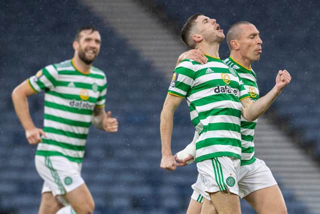 Celtic's Ryan Christie celebrates with team mate Scott Brown after he curls home to make it 1-0 during the William Hill Scottish Cup semi-final match against Aberdeen at Hampden. (Photo by Alan Harvey / SNS Group)